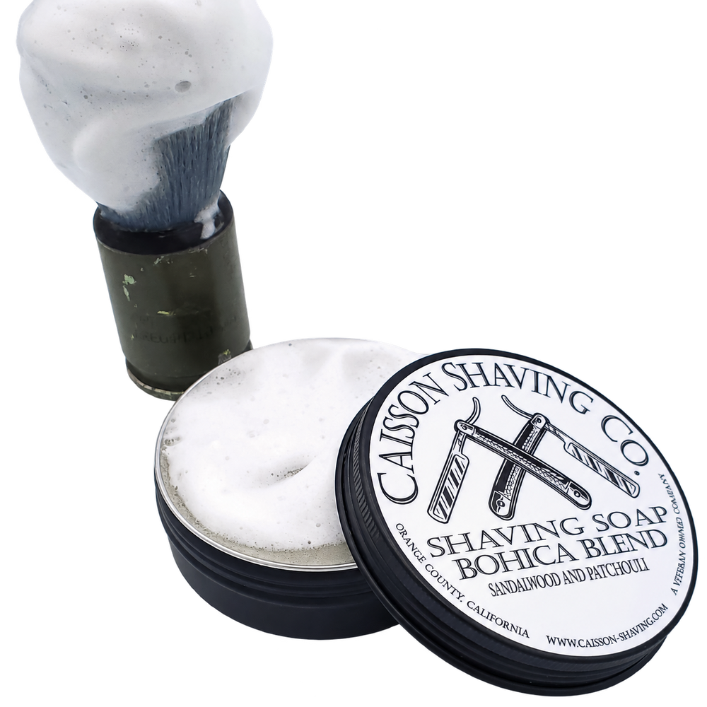 Bohica Blend sandalwood and patchouli shaving soap with a lathered shaving brush.