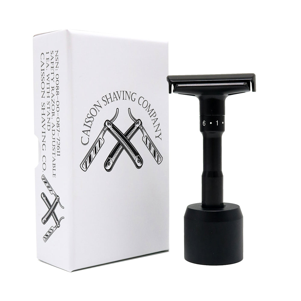 Caisson adjustable double edge safety razor and stand beside its box.