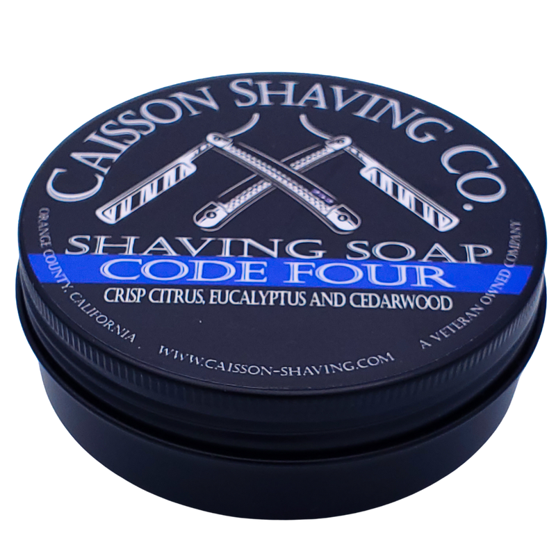 Closed can of Caisson Code Four shaving soap.